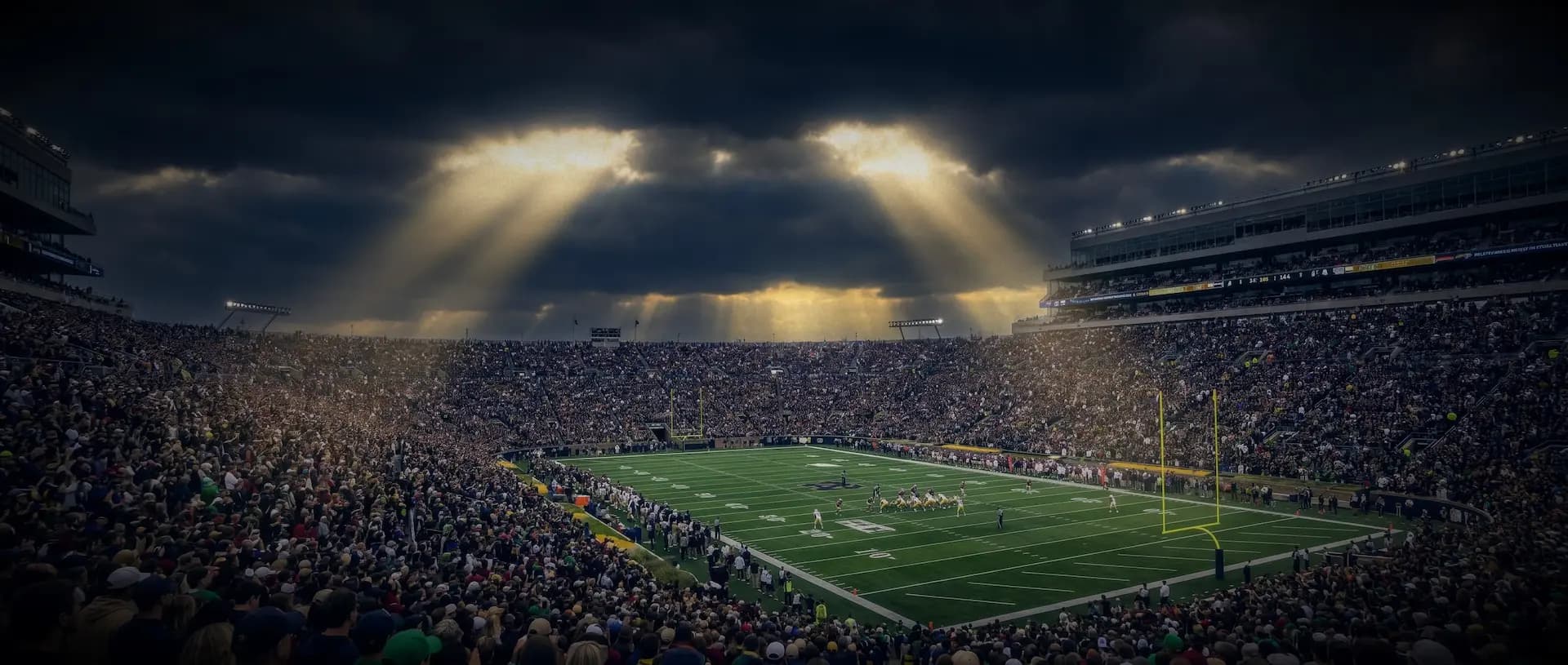 Stadium lights illuminating the field at night